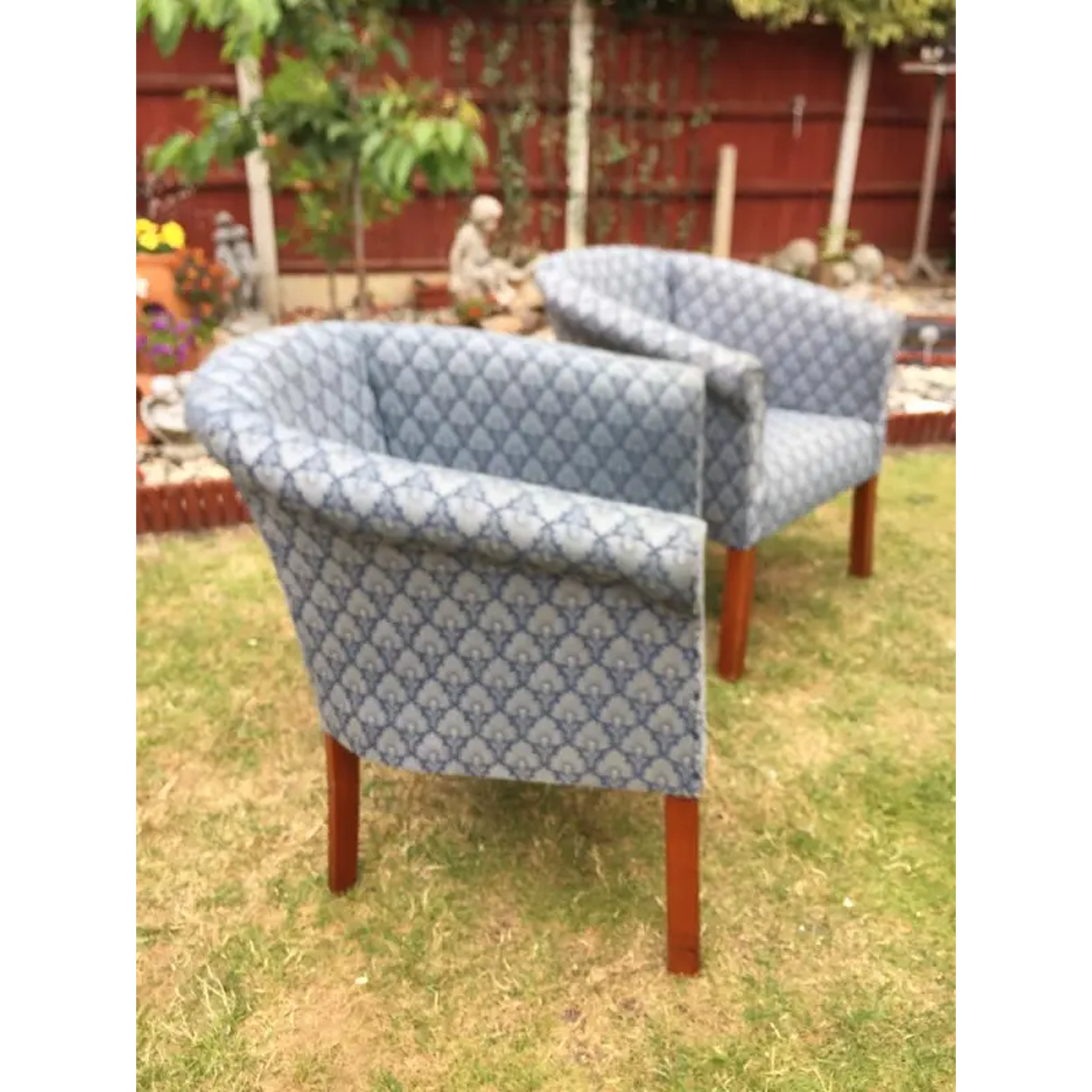 Two matching cup chairs. Delivery available.